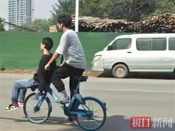 震惊！男子坐共享单车车篮摔死 同伴担全责，法律警示不可忽视